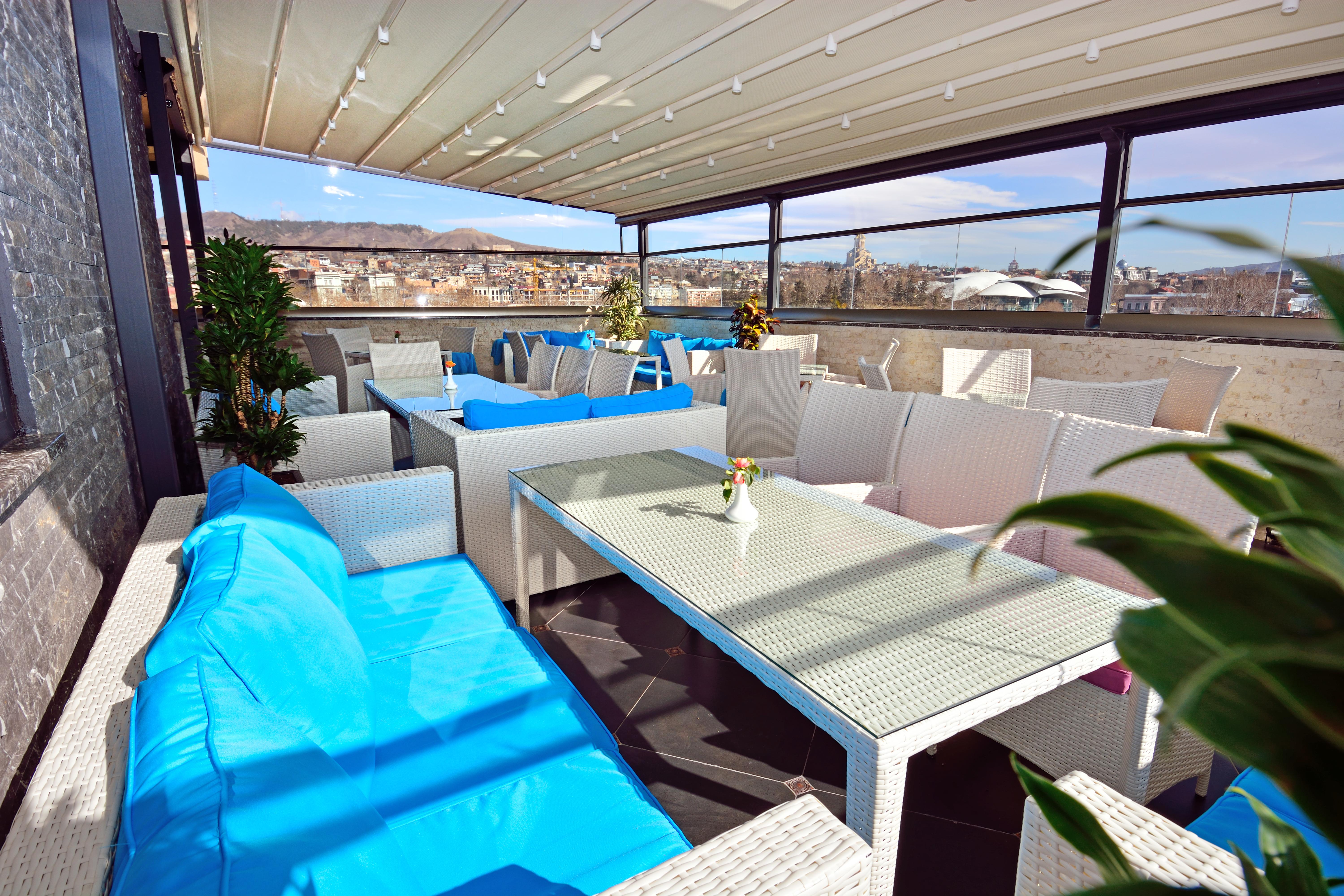 River Side Hotel Tiflis Exterior foto A 3D rendering of a balcony